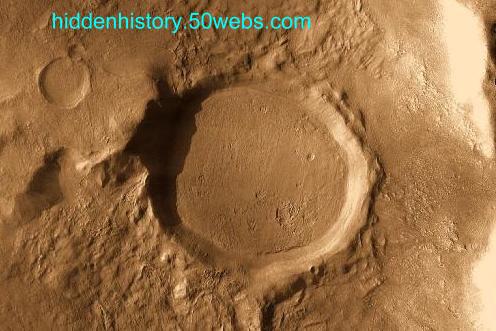Leveled and symmetrical crater, on Mars. Leveled and symmetrical crater, on Mars.